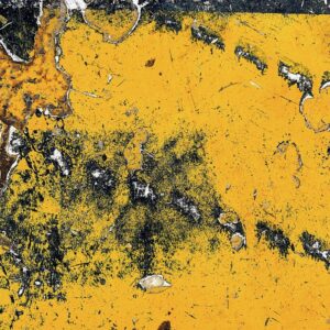 jaune vif sur anthracite, photo d'art, macro, atmosphère industrielle.